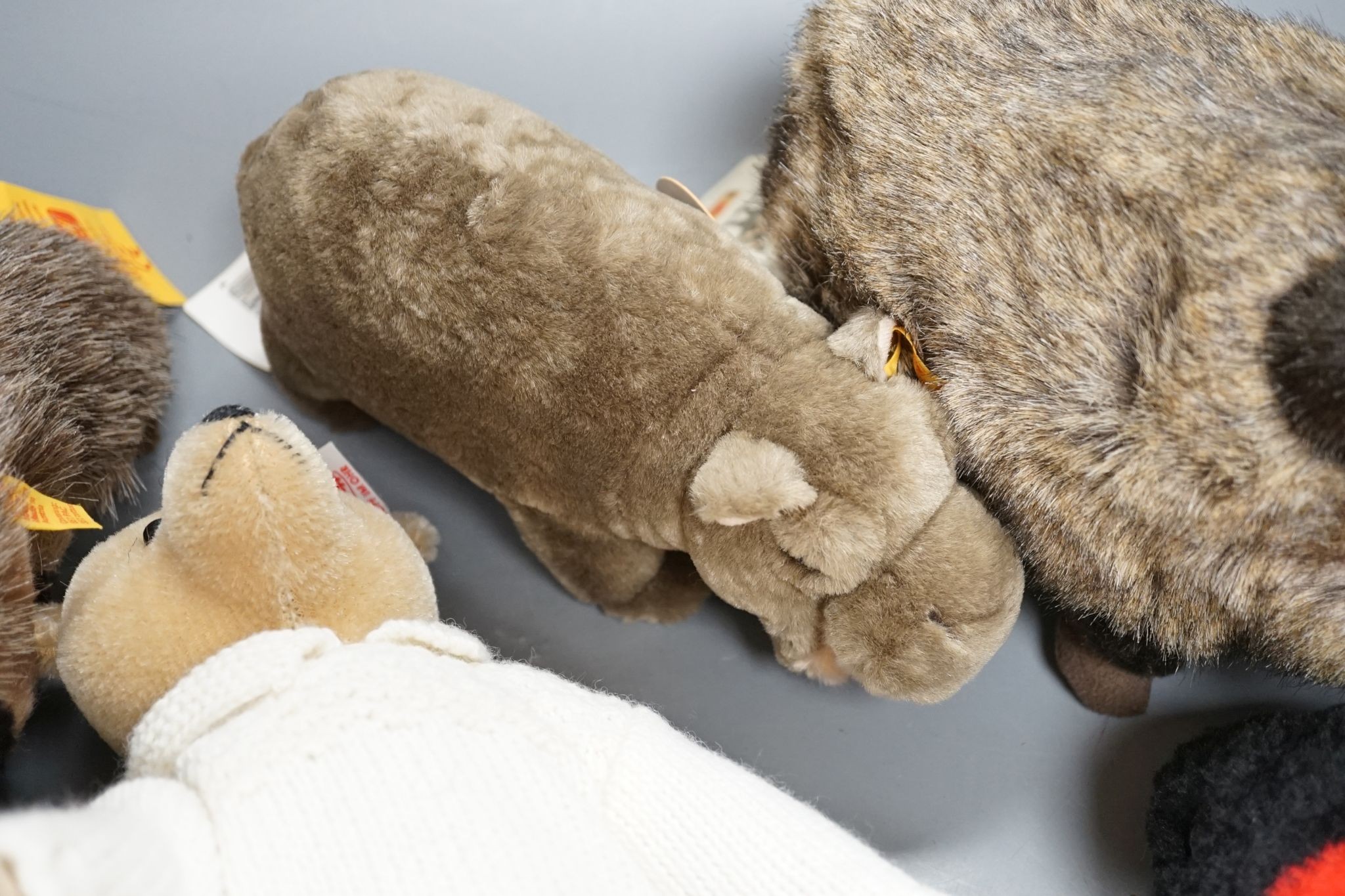 Seven Steiff animals including two 'Gaty', all post-war, and a 'Nora' bear Limited Edition with parasol